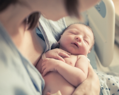 Mother holding newborn